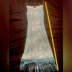 Women’s beautiful sequin/macrame dress, size medium. Aqua colored. Used once.